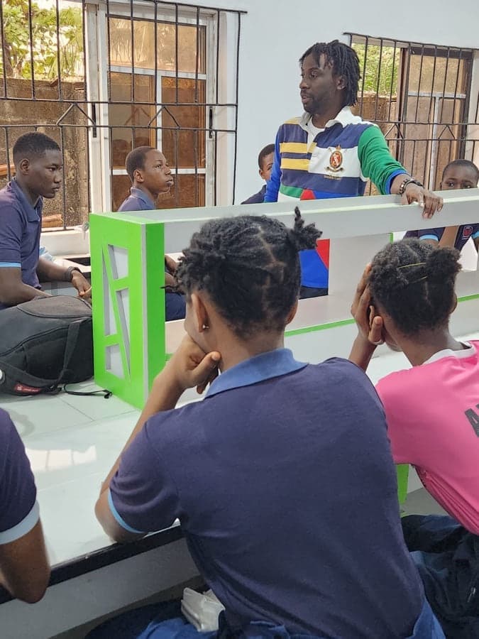 Divine Oshideko in conversation with young people